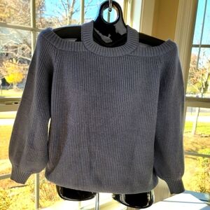 Cold/off the shoulder, open back, crew neck cable knit sweater
